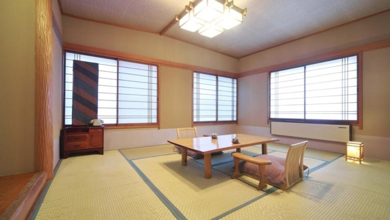 Hotel Hinokitei Bokusui à Kusatsu  Extérieur photo