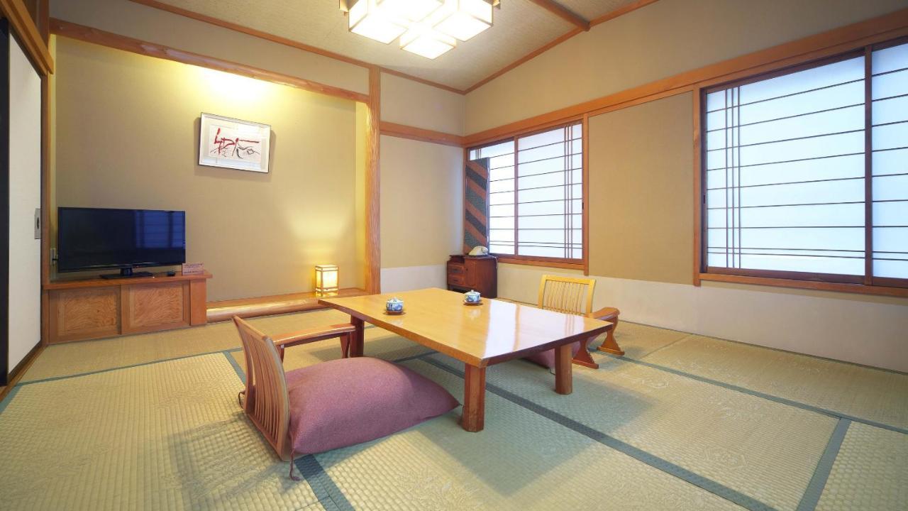 Hotel Hinokitei Bokusui à Kusatsu  Extérieur photo