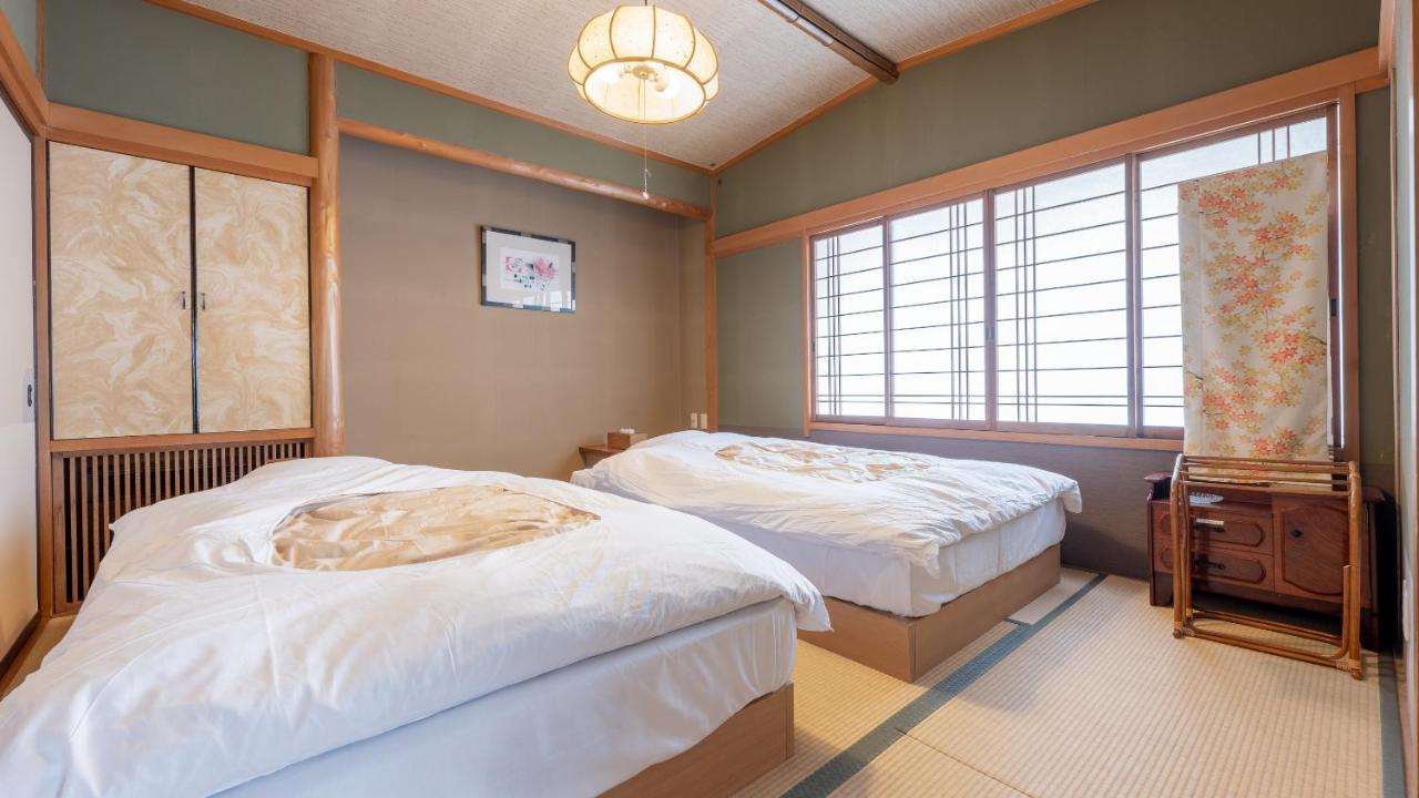Hotel Hinokitei Bokusui à Kusatsu  Extérieur photo