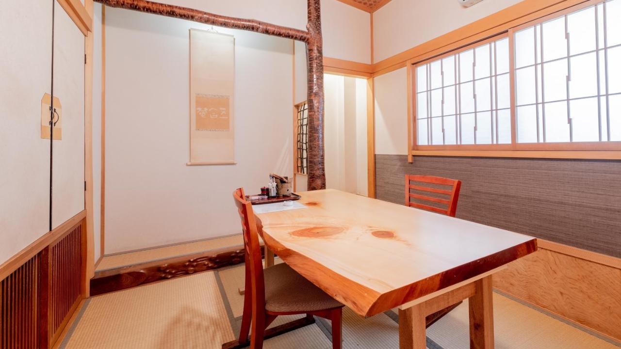 Hotel Hinokitei Bokusui à Kusatsu  Extérieur photo