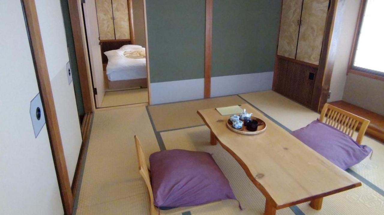 Hotel Hinokitei Bokusui à Kusatsu  Extérieur photo